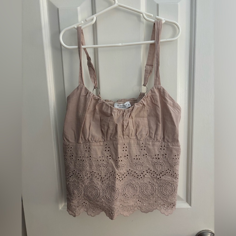Nude colored cropped tank